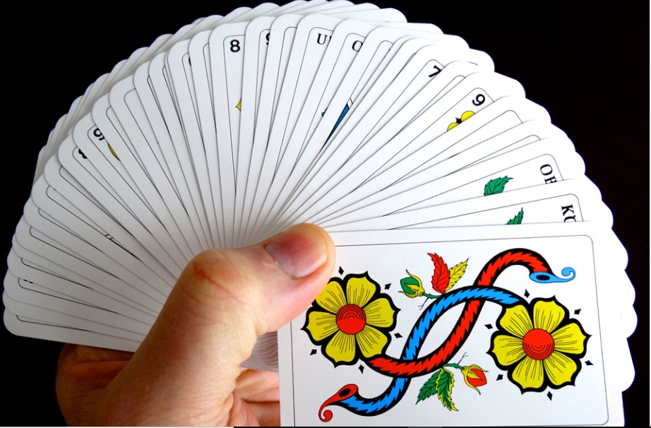 holding many cards